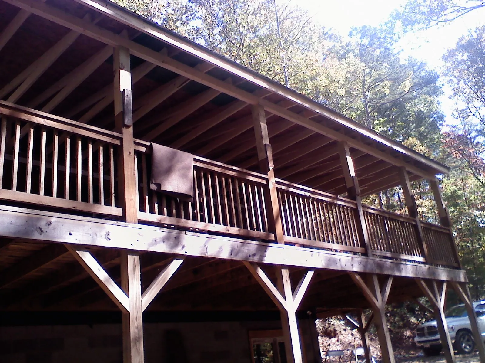 Timber framing under a new elevated porch and deck — Roof Leak Repair in Roaring River by Roofing Brothers